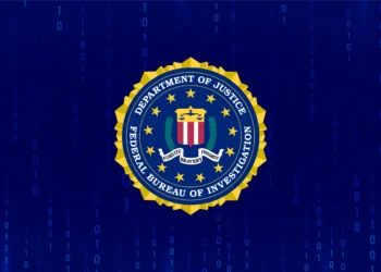 FBI seal overlaid on blue matrix-style code background representing the China-linked FBI surveillance system breach