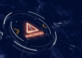 Minimal dark cybersecurity interface with a glowing red malware alert on a blue digital grid.
