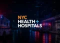 NYCHHC logo over dark hospital emergency entrance with ambulances, cyberattack-themed lighting, and digital glitch effects at night
